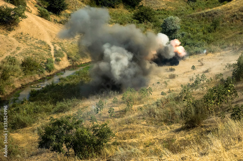 Explosion at a military training ground. Fototapet