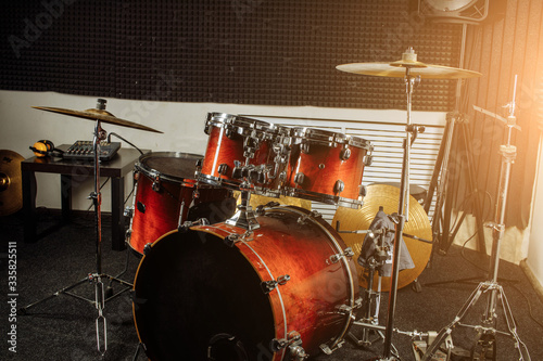 professional drum sets in recording studio  professional musical equipment  arts culture and entertainment  musical instrument  music  rock and rollconcept