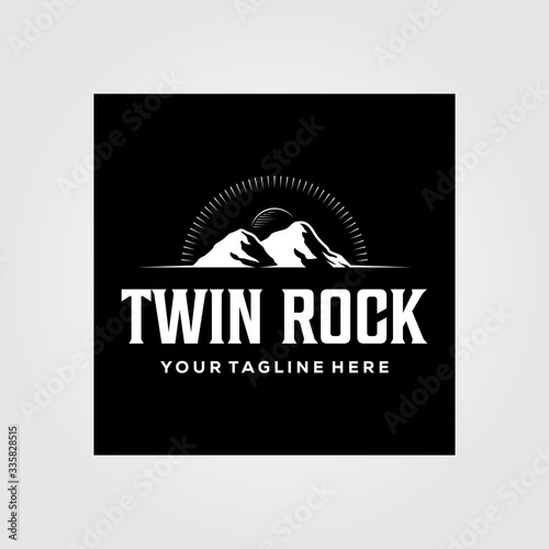 vintage twin rock mountain and sunburst logo in dark background vector illustration