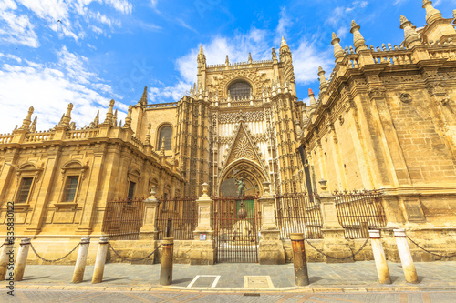 Seville Cathedral is one of sightseeing tourist attractions of Seville, Andalusia, Spain. Cathedral of Saint Mary of the See, a Roman Catholic and the largest Gothic church, is a UNESCO Heritage Site. © bennymarty