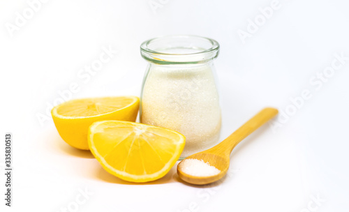 Citric acid on a white isolated background. Selective focus. photo