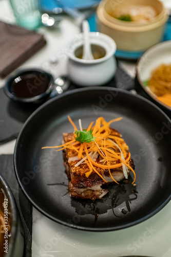 Luxury Chinese foods on table in Chinese restaurant.