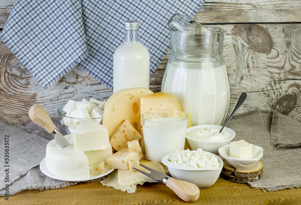 Fresh dairy products on a wooden table. Fresh dairy products on a wooden table.