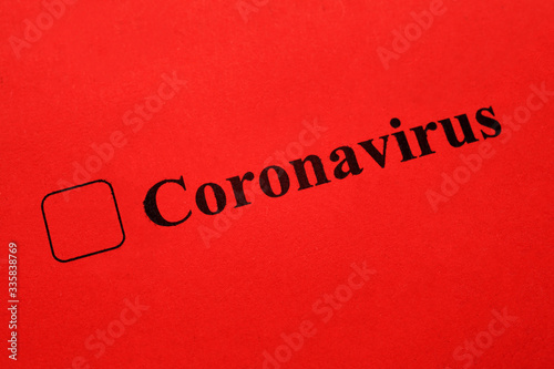 Coronavirus - checkbox with a tick on red paper. Checklist concept.