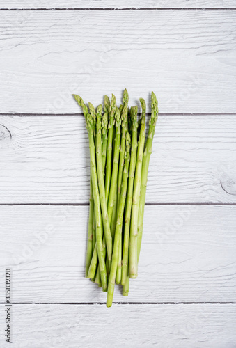 Asparagus on a white wood background