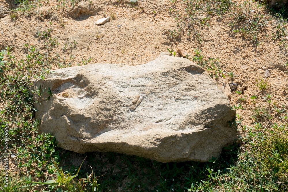Large gravel from the mountains that are outdoors on the ground. Large gravel from the mountains that are outdoors on the ground.
