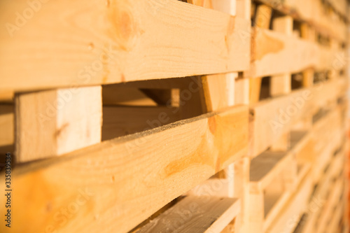 Folded empty wooden boxes in warehouses