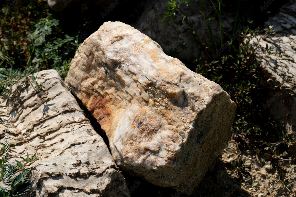 Large gravel from the mountains that are outdoors on the ground. Large gravel from the mountains that are outdoors on the ground.