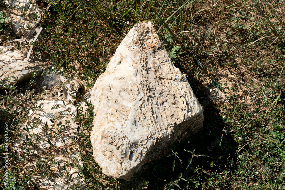 Large gravel from the mountains that are outdoors on the ground. Large gravel from the mountains that are outdoors on the ground.