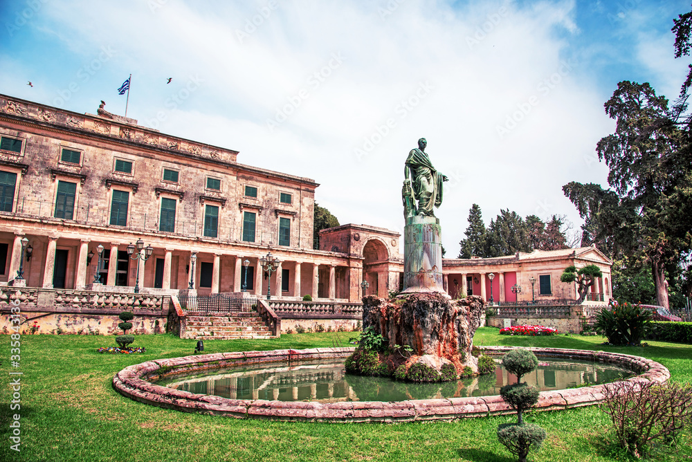 beautiful landscape with Statue of Frederick Adam in front of the Royal palace of St. Michael and St. George (Museum of asian art) in Corfu, Greece. Amazing places. Popular tourist atraction.