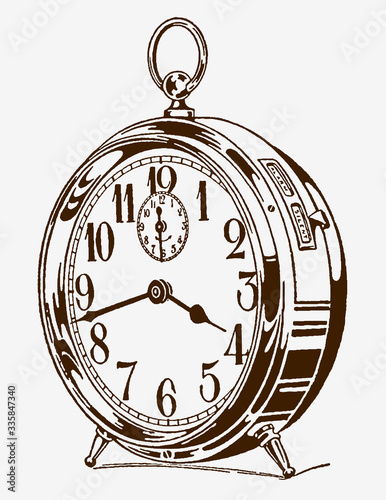 Historical wind-up, mechanical, spring-driven alarm clock. Illustration after an engraving from the early 20th century