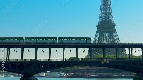 Metro train over Bir-Hakeim bridge and the Eiffel Tower - Paris - France photo
