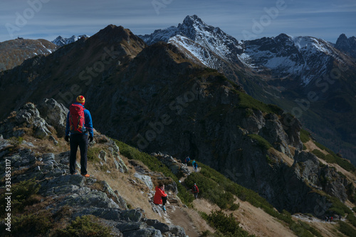 Tourist hiking in Tatra Mountains © Dawid