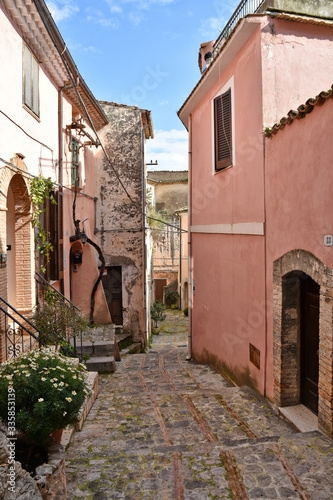 Fototapeta Naklejka Na Ścianę i Meble -  A narrow street in a small village in central Italy