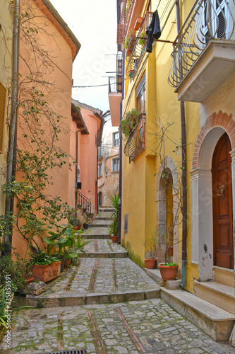 Fototapeta Naklejka Na Ścianę i Meble -  A narrow street in a small village in central Italy
