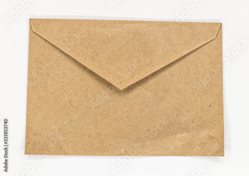 Old crumpled envelope on white background