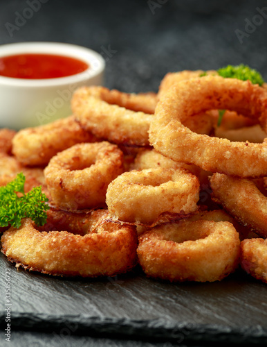 Oven baked breaded calamari rings served with lime wedges, sweet chilli sauce and mayonnaise