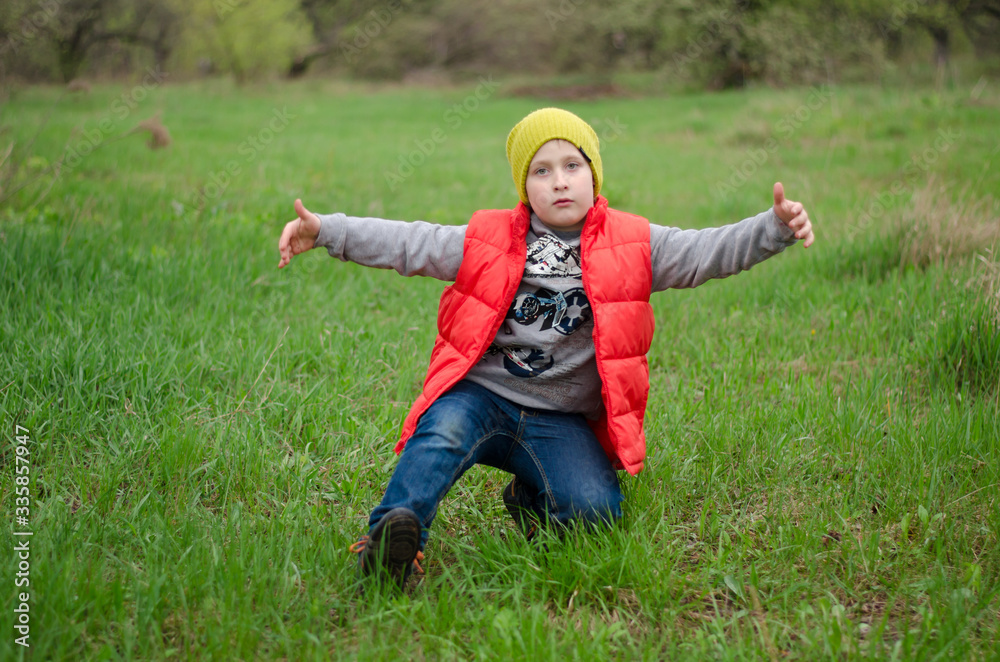 happy boy dancing on the grass happy boy dancing on the grass