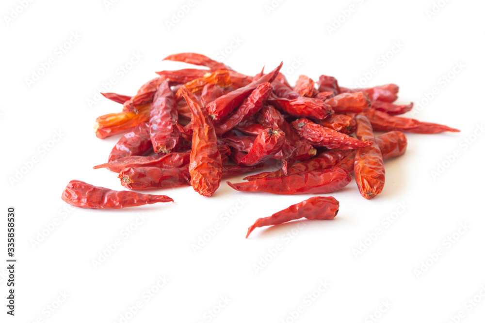 Dried pepper chillies on white background Dried pepper chillies on white background
