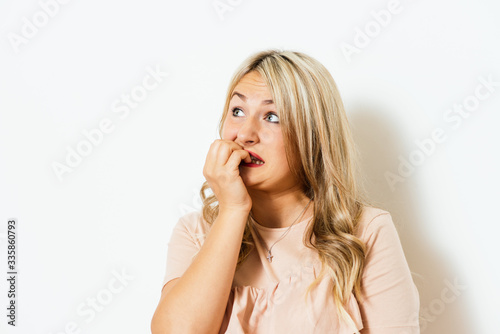 Woman bites his nails