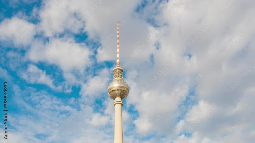 Berlin, Germany. View of TV Tower on Alexanderplatz in Berlin, Germany during a cloudy day. Time-lapse with fast moving clouds Berlin, Germany. View of TV Tower on Alexanderplatz in Berlin, Germany during a cloudy day. Time-lapse with fast moving clouds