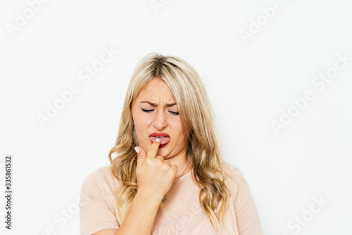 Girl nausea finger in mouth
