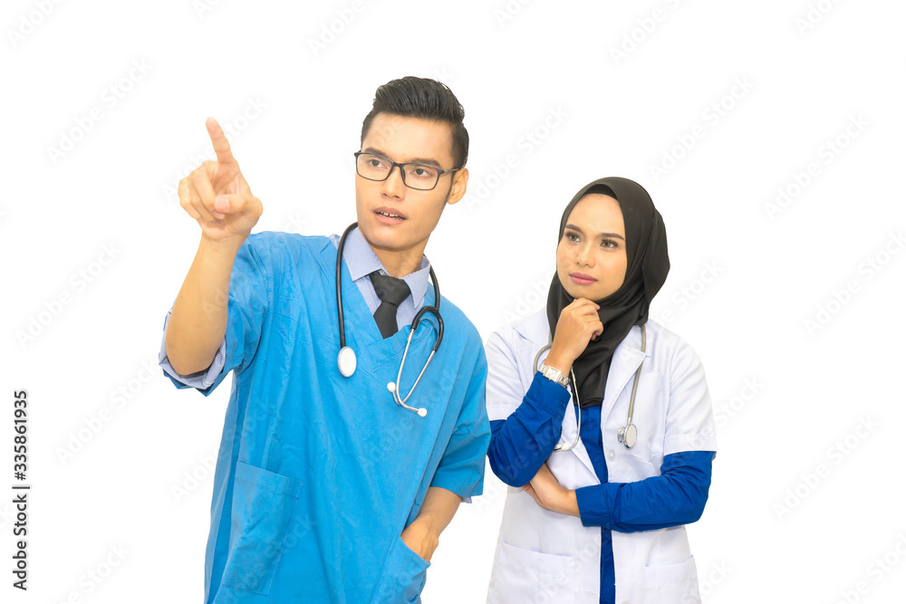 Asian muslim doctor hand touching empty virtual screen. Modern medical background concept Asian muslim doctor hand touching empty virtual screen. Modern medical background concept