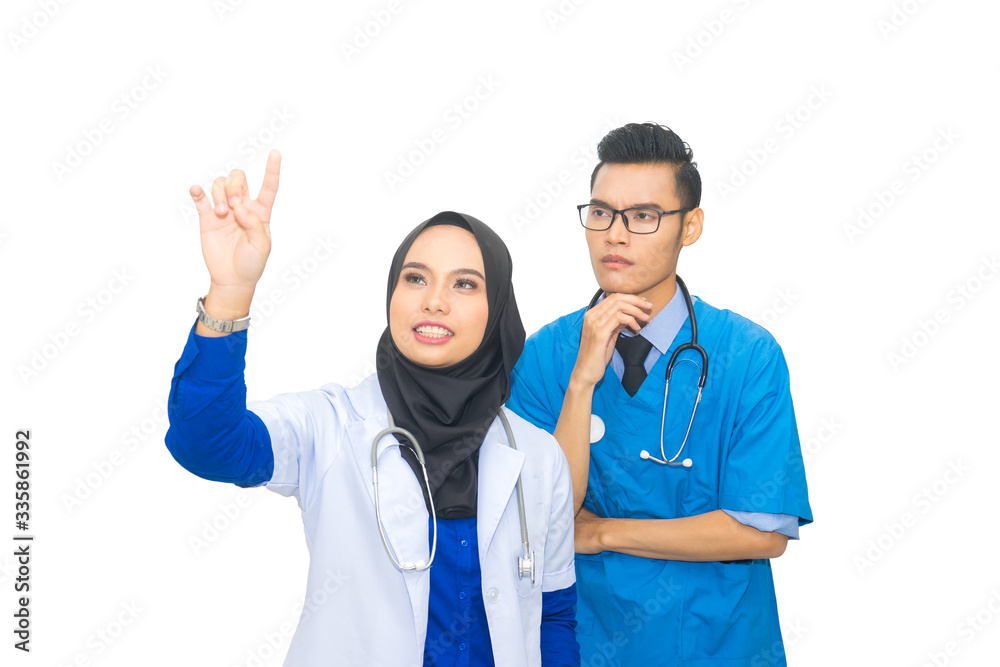 Asian muslim doctor hand touching empty virtual screen. Modern medical background concept Asian muslim doctor hand touching empty virtual screen. Modern medical background concept