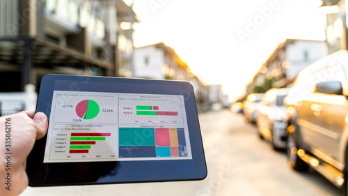 Business man analysis graph visualization on mobile for anywhere anytime