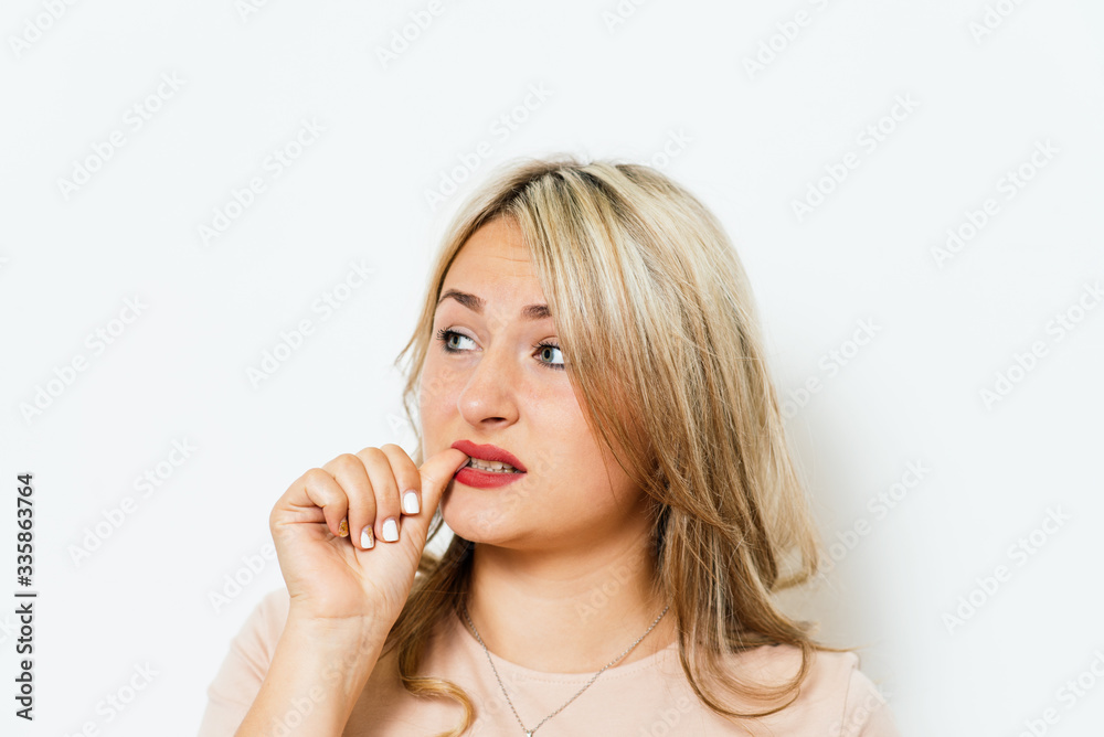 Woman bites his nails