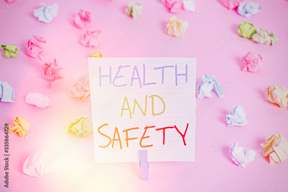 Conceptual hand writing showing Health And Safety. Concept meaning procedures intended to prevent accident in workplace Colored crumpled papers empty reminder pink floor clothespin