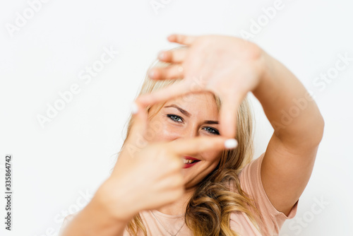 woman making a hand frame