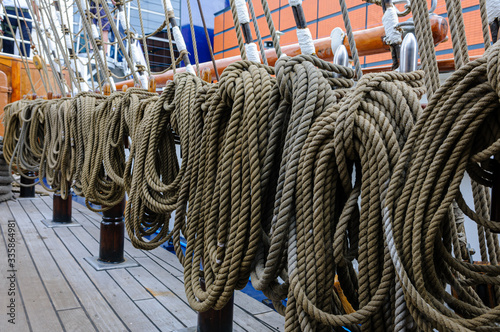 Ropes coiled up on board a sailing ship. photo