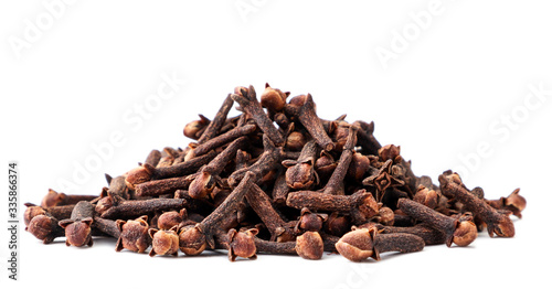 Clove spice slide closeup on a white. Isolated