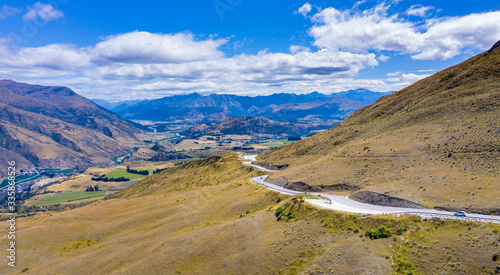 Winding road high in the mountains between Queenstown and Wanaka, called Crown Range.