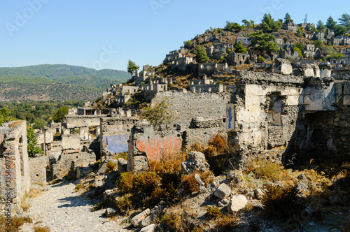 Ruins at the former Greek village of Kayakoy in Turkey, abandoned 1922, now a museum and also known as the Ghost Town. photo