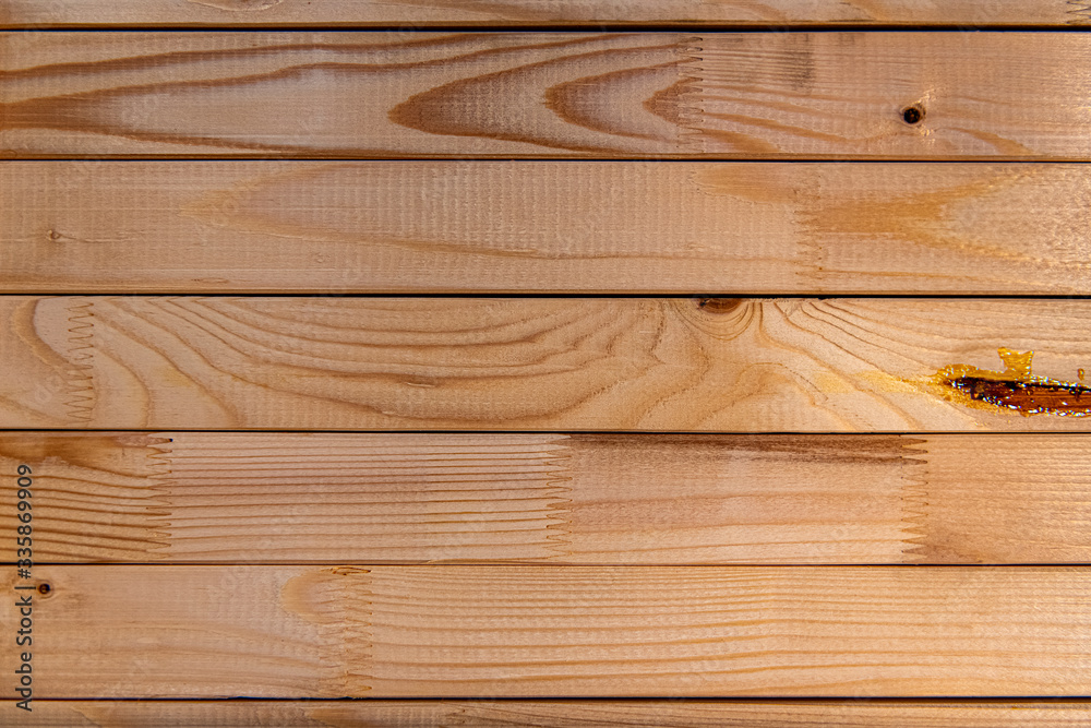 Obraz premium Brązowe deski z sękami - drewniane tło 