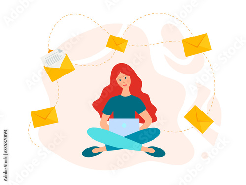 Young girl works and studies from home at the computer