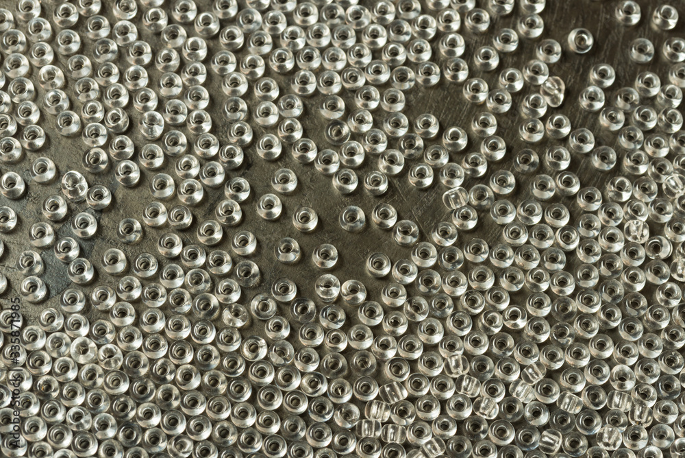 Glass seed beads textured background Glass seed beads textured background