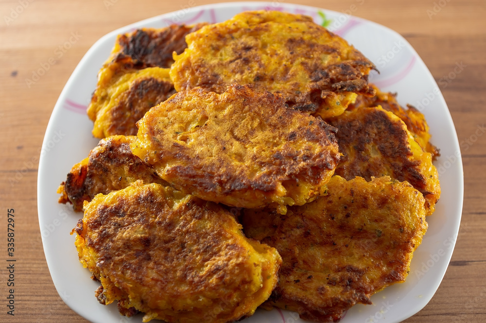 Potato pumpkin burgers, pancakes. Studio Photo cooking Potato pumpkin burgers, pancakes. Studio Photo cooking