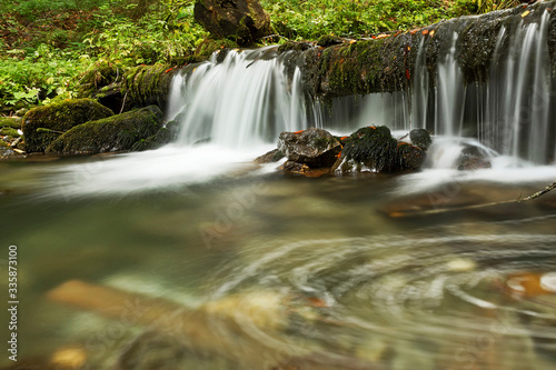 Fototapeta Naklejka Na Ścianę i Meble -  waterfall on mountain stream