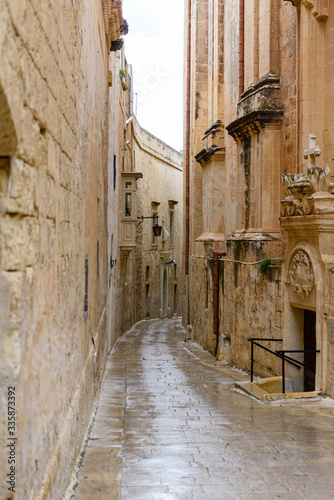 Narrow street in heavy rain  Mdina  Malta