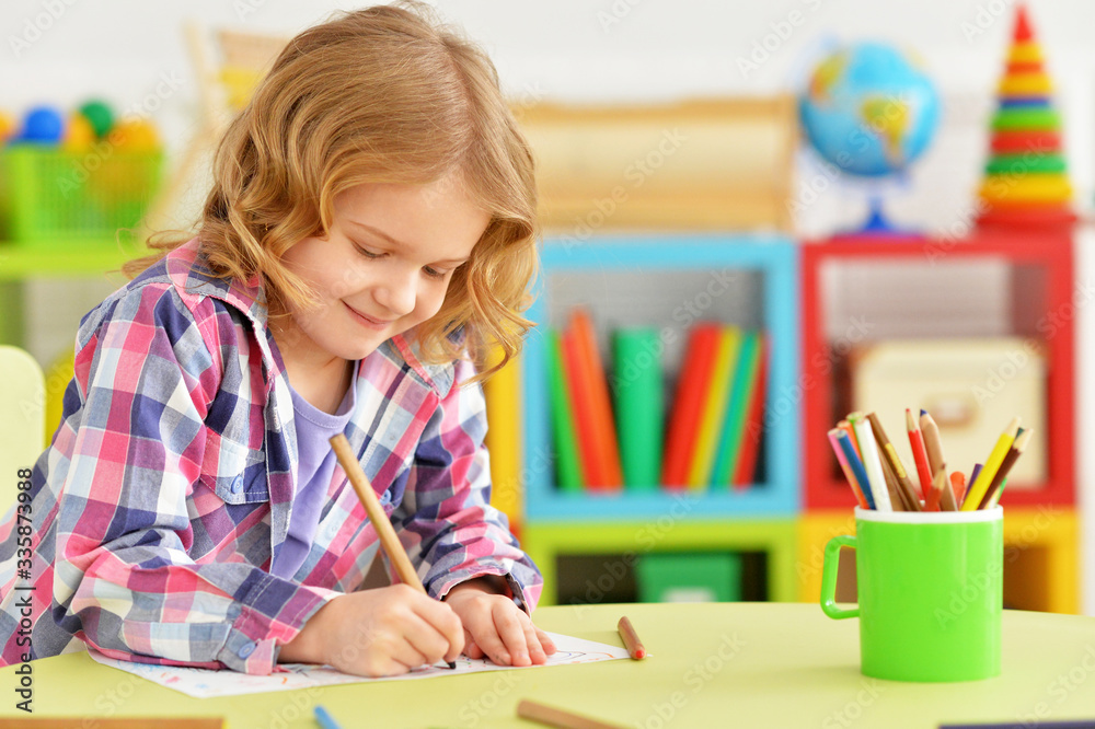 Close up portrait of cute smiling girl drawing Close up portrait of cute smiling girl drawing