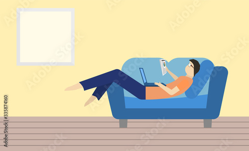 Working from home during COVID-19 concept, man lay on blue sofa with laptop and data sheet on hand.
