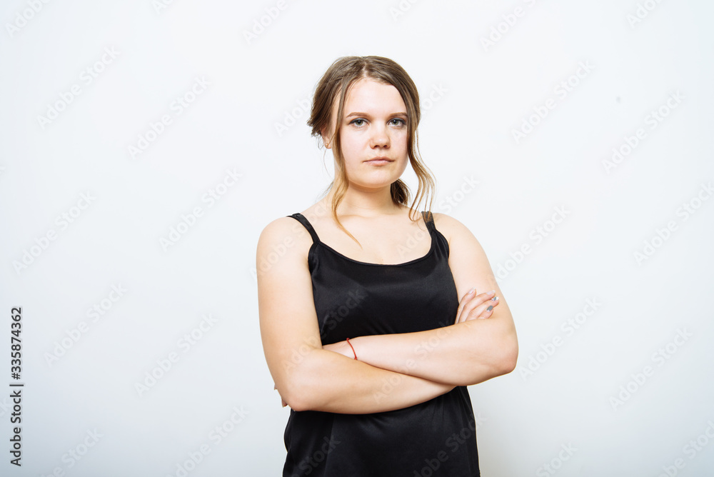 Portrait of a woman arms folded