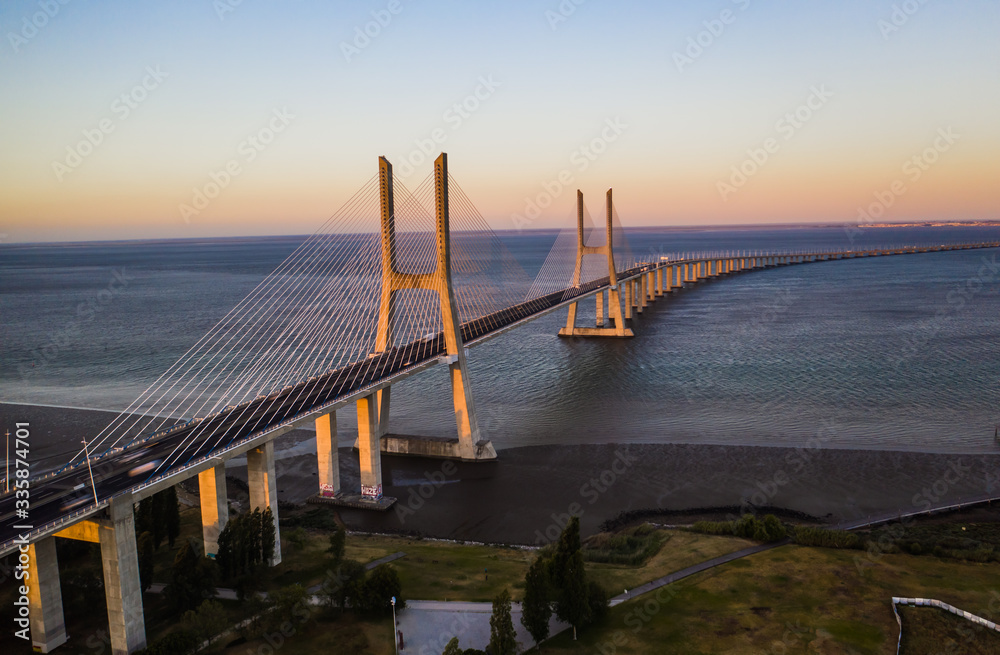 Obraz premium Vasco de Gamma bridge in Lisbon in Portugal, aerial drone view