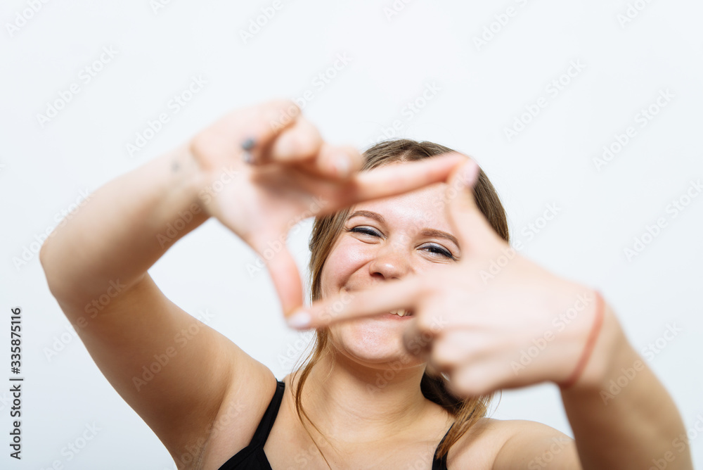 Fototapeta premium woman making a hand frame