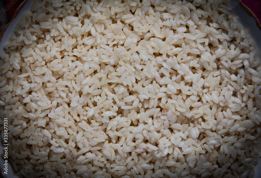 A full plate of raw rice. Pilaf ingredient A full plate of raw rice. Pilaf ingredient