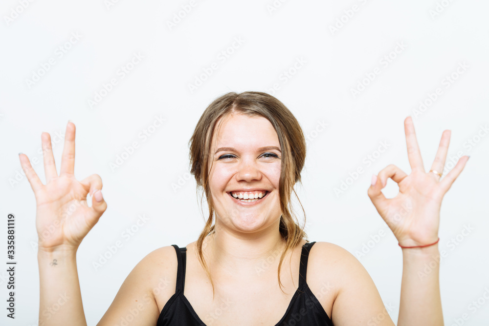 Woman making an ok sign Woman making an ok sign