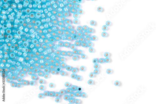 Isolated beads on a white background, scattered beads, blue beads